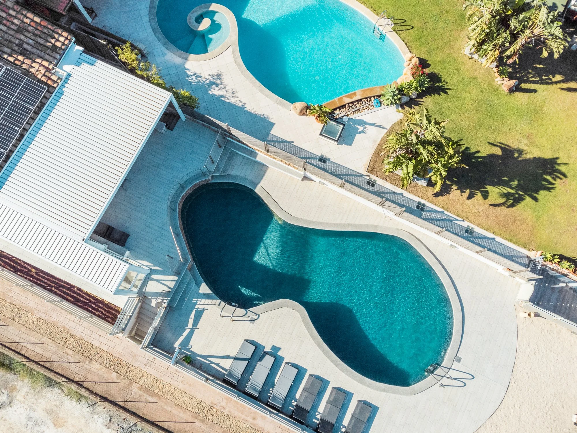Aerial view of luxury villa pools in Sardinia